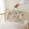 Torba dla mamy do wózka XL organizer podróżny kremowa 48 cm